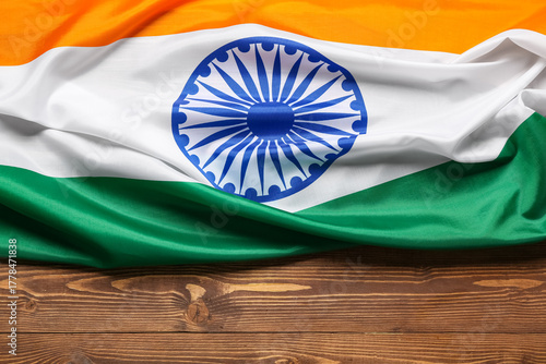 Flag of India on wooden bac...