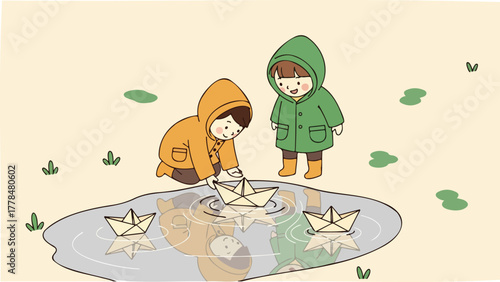 Two young children in raincoats playing with paper boats in a puddle on a light-colored field.