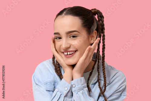 Happy young woman with brai...