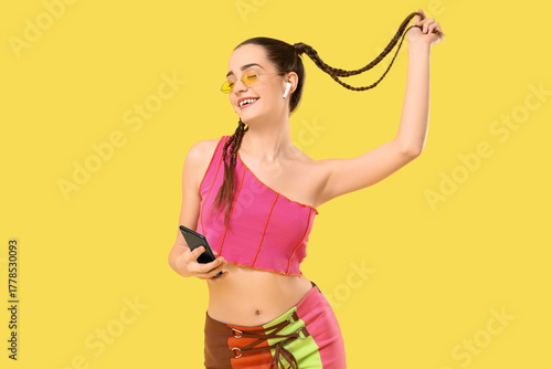 Happy young woman with brai...