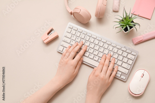 Female hands with computer ...