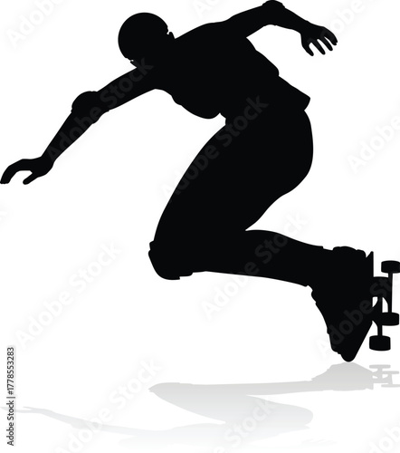A skateboard woman or girl female skateboarder in silhouette.