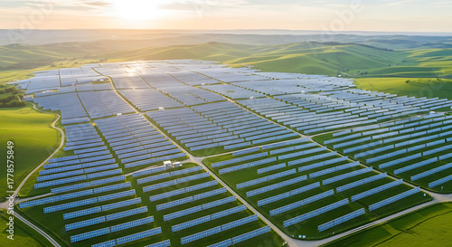 Wallpaper Mural Aerial View of Solar Panel Farm with Green Fields Under the Golden Sunset Torontodigital.ca