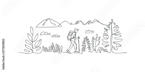 Lone hiker with backpack walks through landscape
