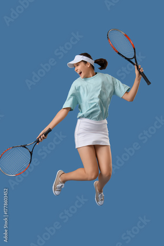 Happy young female tennis p...