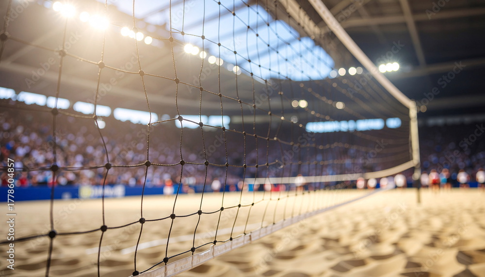 Fototapeta premium Beach Volleyball Net Close-up with Crowd and Sunlight