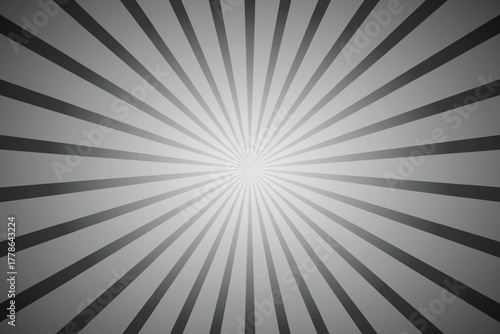 Abstract radial sunburst pattern with light emanating from the center