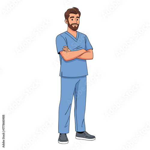 Young male nurse with a beard and brown hair wearing blue scrubs and standing with arms crossed.