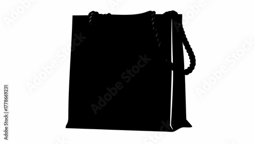 A sleek black shopping bag stands upright with rope handles against a plain white background showing elegance and style silhouette