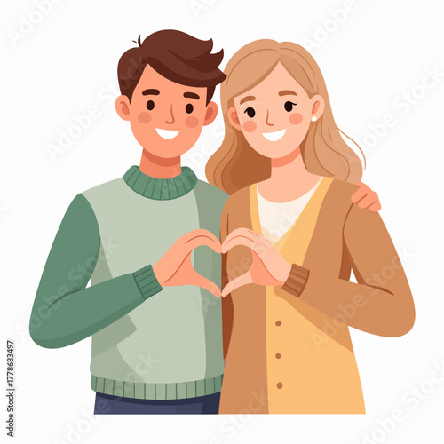 Smiling couple making a heart shape with their hands, showing affection and love.