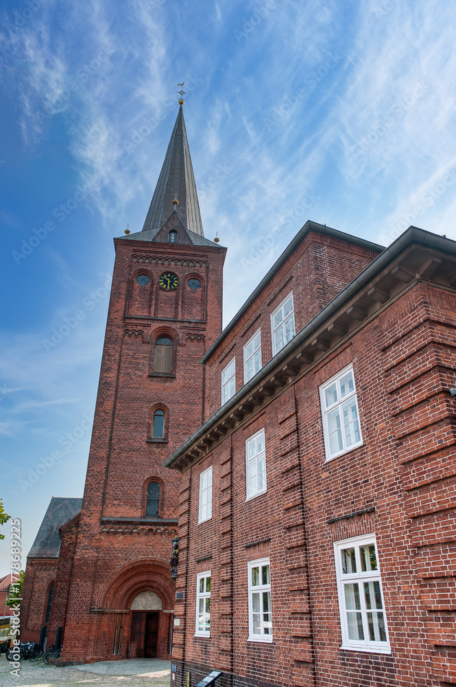 Obraz premium Plon is located in the Plon District, in the state of Schleswig-Holstein, Germany. It is situated on the shore of a large lake.