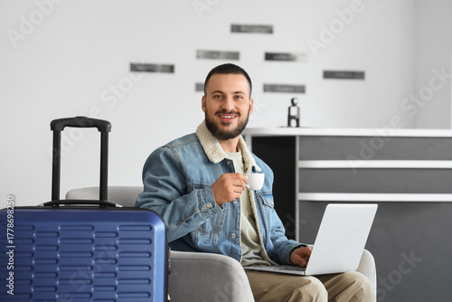 Young man with coffee and l...
