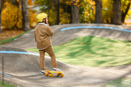 Little boy with helmet and ...