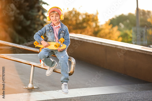 Cool little boy with headph...