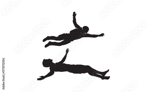silhouette of a man jumping  and parachute