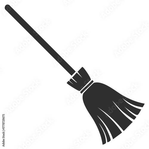 Dark Silhouette of a Traditional Broom on a White Background