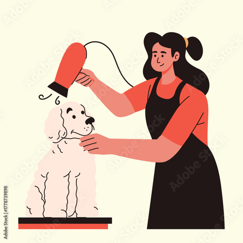 Pet Grooming drying the freshly bathed dog to make its fur fluffy and comfortable