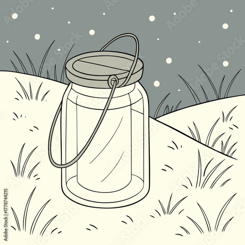 A jar with a candle inside sits on a snowy hill in the winter