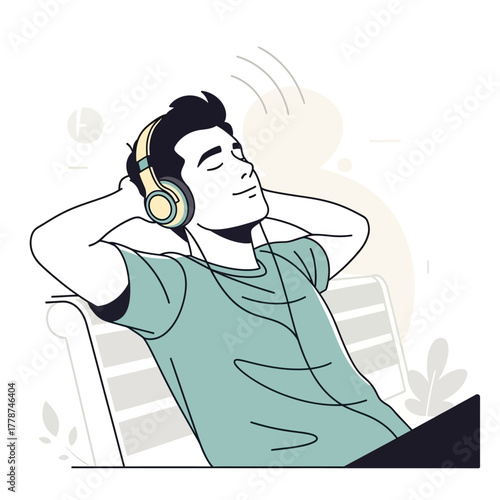Young man relaxing with headphones enjoying music.