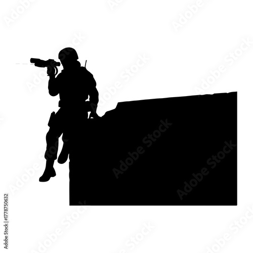 Soldier aiming weapon from elevated position silhouette