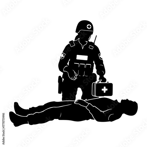 Soldier providing medical aid to injured person first aid