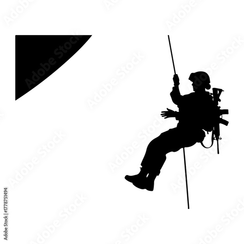 Soldier rappelling down rope military gear
