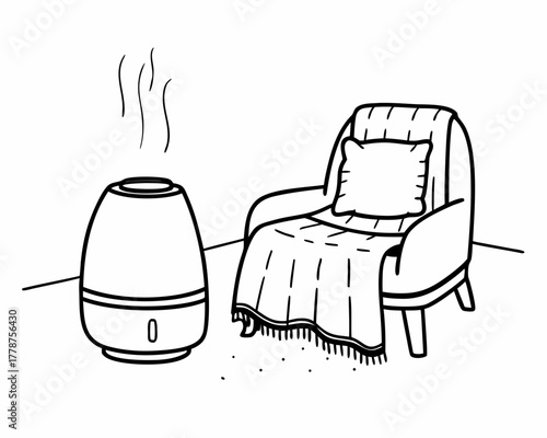 Humidifier emitting steam next to an armchair