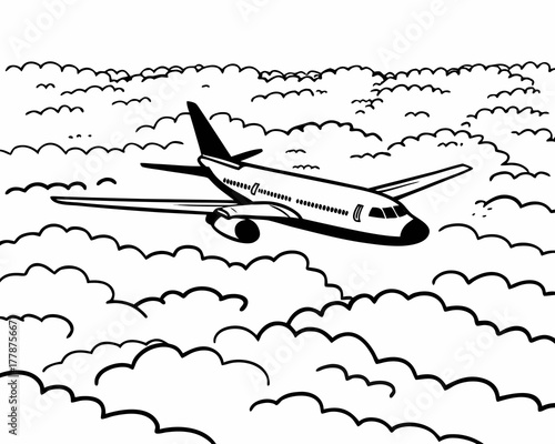 Airplane flying high in the sky surrounded by clouds