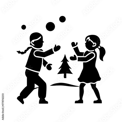 Children playing snowballs in winter season