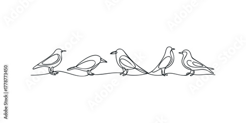 Group of Birds Perched on a Wire