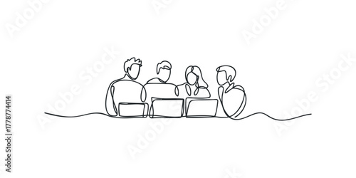 Team working with laptops in a meeting