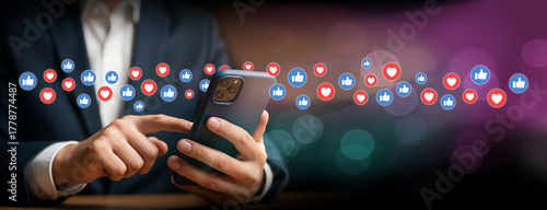 Flowing Social Connections Through Mobile Interaction, Man uses phone with wave of likes and hearts in motion