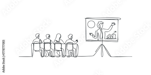 Group listening to presentation on whiteboard