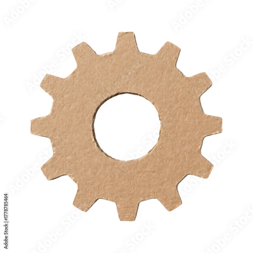 A single cogwheel cutout made of cardboard material with a rustic texture isolated on a transparent background in a realistic 3D render