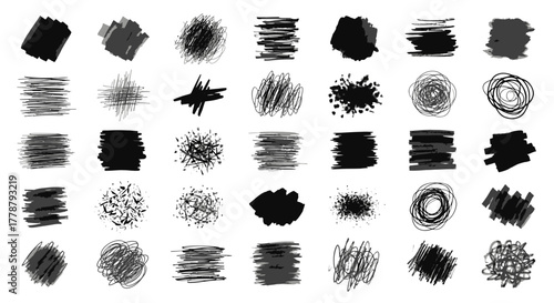 Collection of abstract black ink brush strokes and scribbles on a white background for design elements