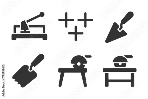Construction and carpentry tools icons set with saw and trowels.