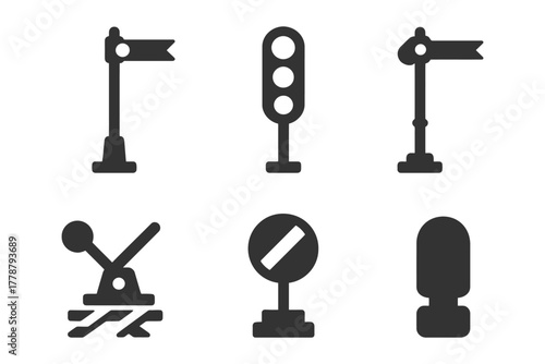 Collection of black silhouette railway icons including signals and traffic lights.