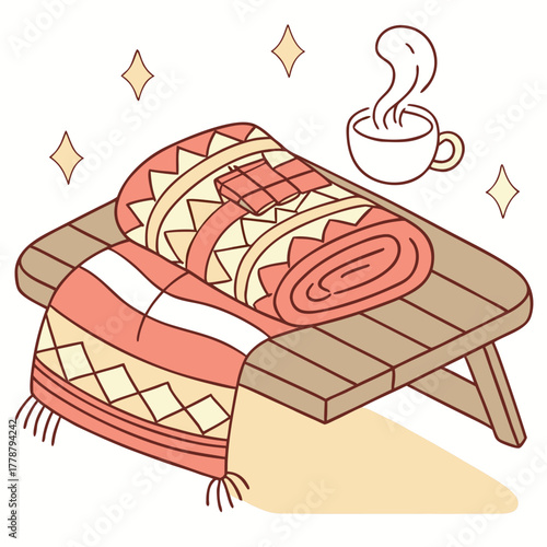 Cozy blanket and hot chocolate on a wooden bench