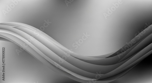 Abstract gray wave background with smooth gradient and flowing lines.