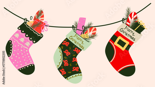 Cute hand drawn set of Christmas stocking filled with gifts, candy cane and pine branches. Illustration for greeting cards, posters, or winter decor.