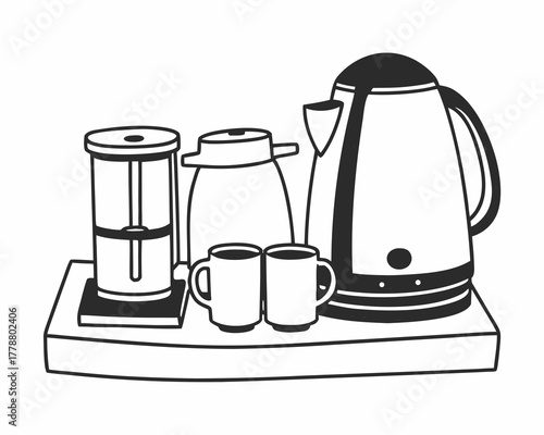Electric kettle and coffee maker on a tray