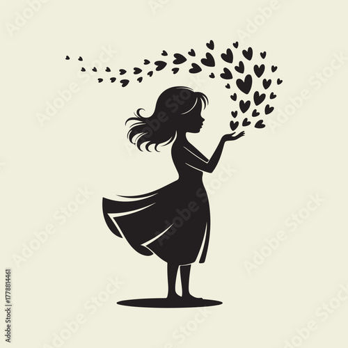 Silhouette of a girl releasing hearts into the air