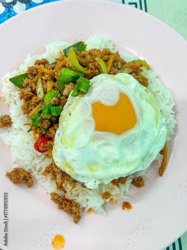 Rice topped with stir-fried pork and basil, Rice topped with stir fried minced pork and basil with Fried egg