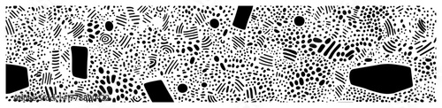 Organic terrazzo cutout pattern with scattered marks and pebbles black and white seamless vector background
