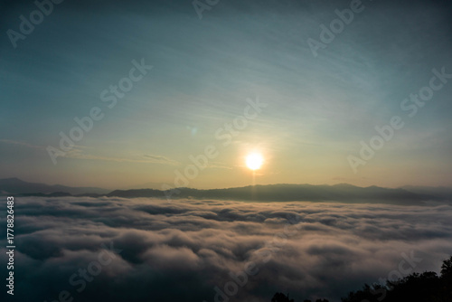 Stunning Sunrise Over a Sea of Clouds and Mountain Range