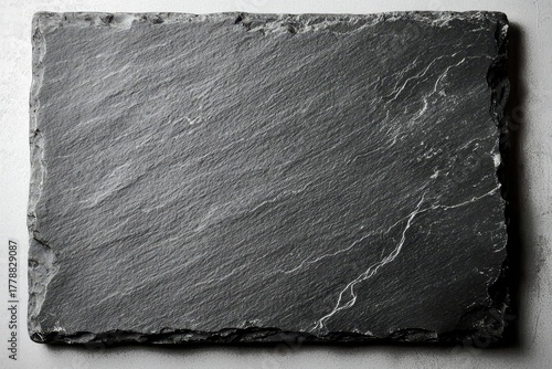 Obraz na płótnie Top view of a rounded corner black slate rectangle.