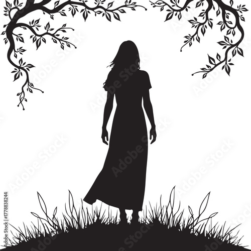 Silhouette of a woman in a long dress standing in grass under tree branches
