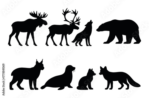 Silhouettes of diverse wildlife animals on olive background