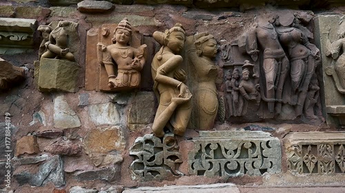 Famous Stone Carving Sculptures Of Khajuraho In India, Erotic educational sculptures of temples of Khajuraho, Madhya Pradesh. Beautiful Stone Carvings In Khajuraho Temple, UNESCO World Heritage Site 