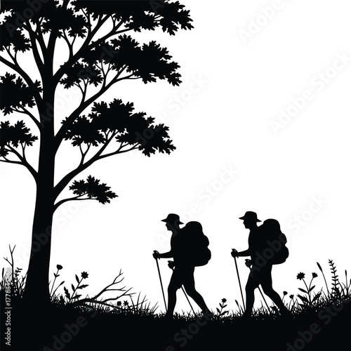 Two hikers with backpacks on a trail